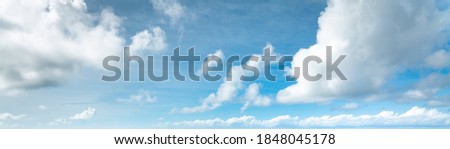 Blue sky with small clouds