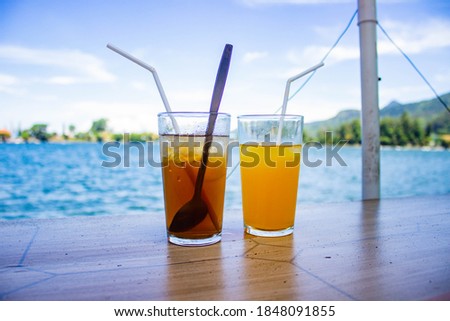 Enjoying Sarangan Lake with Lemon Juice and Iced Tea