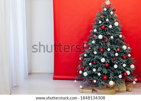 Christmas tree with gifts New Year scenery room red