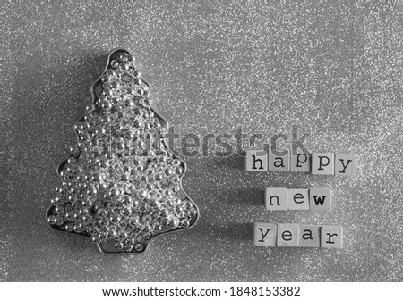 silver christmas tree. happy new year 2021. happy new year inscription.