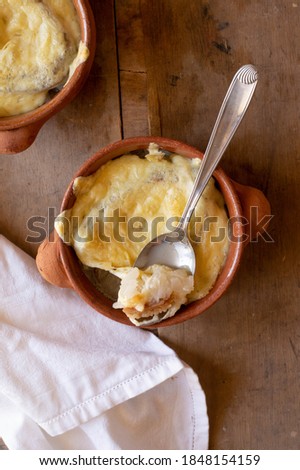 French onion soup with purple onion, bread and cheese