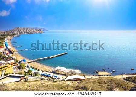 Panoramic photo of the sea and mountains from above