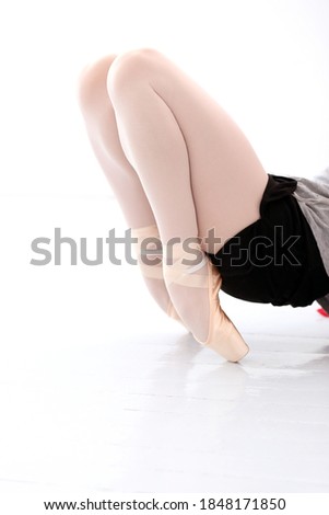 Beautiful ballerina's feet during stretching