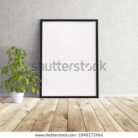 White empty poster with frame mockup standing on floor. Mock up for you design print.