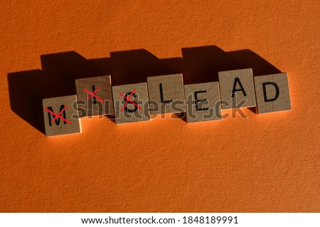Mislead, with the prefix Mis crossed out to leave the opposite word Lead Royalty-Free Stock Photo #1848189991