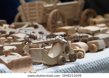 wooden toys on the table. raw parts
