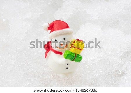 Snowman white on snow Christmas and happy new year day