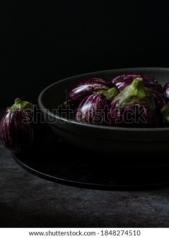 baby aubergines still life dark food photography