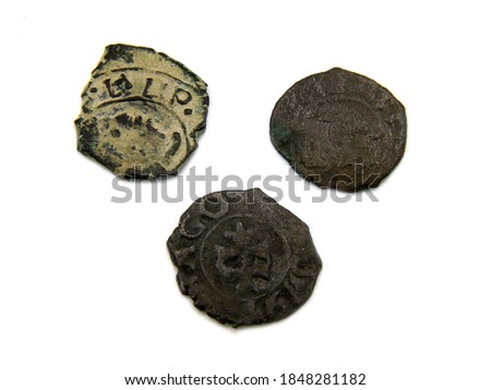 Medieval european copper coins on white background isolated