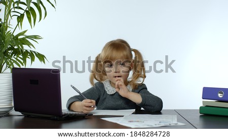 Back to school, online learning for kids, distance lesson, education at home, technology for schoolgirl, conference. Children doing homework at home. Child girl on white background