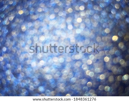 Abstract textural defocus lights bokeh blue background