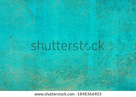 Azure texture of the wall. Blue block with smudges and mildew on the texture. Background for the design.