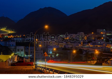 Car Motion Trails on a peaceful night in a small town in Muscat, Oman.