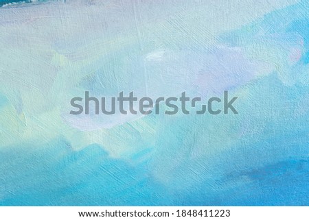 Blue background with oil paint. Beautiful close - up brushstrokes. Textured abstract background. Oil painting on cardboard and canvas. Winter and Christmas concept. Layout for greetings. Royalty-Free Stock Photo #1848411223