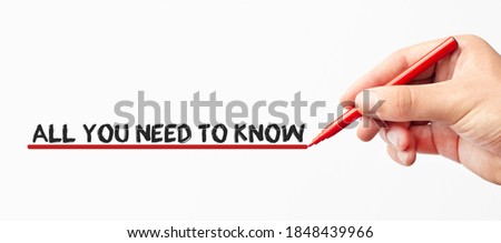 Hand writing All you need to know with red marker. Isolated on white background. Business, technology, internet concept. Stock Image