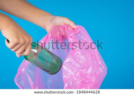 Dumping garbage in garbage bags