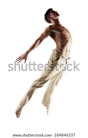 Adult caucasian male dancer wearing beige pants. Image is isolated on a white background.