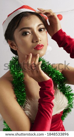 Beautiful women with christmas Tree