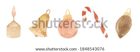 Collection of Christmas items. Watercolor drawing. Candle, bell, Christmas tree toy, candy cane. Traditional objects for the winter holiday.