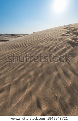 Desert under sunny skies in Tongliao, Inner Mongolia, China