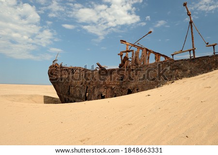 The wreck of the ship Eduard Bohlan rusting away in the Namib desert since 1909 Royalty-Free Stock Photo #1848663331