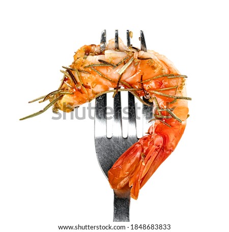 roasted peeled prawn and dry rosemary with fork isolated on white background ,grilled shrimp