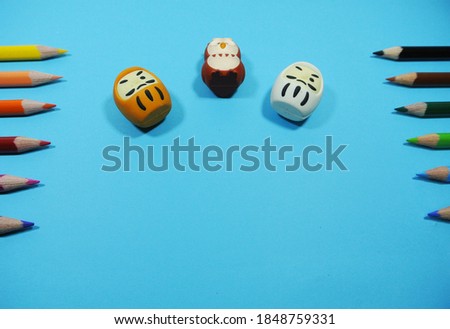 Color pencil with isolated blue background. Three pieces icon is Japanese cartoon.