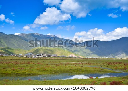Pictures of mountain views and rural villages with clear skies.