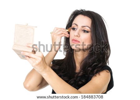 businesswoman with a make-up mirror
