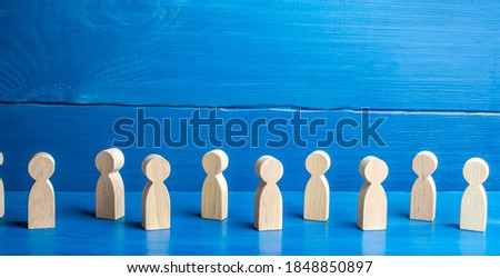 Figures of people on a blue background. Maintaining a safe distance in queue. New normal. Society concept. Communication. Population and citizens. Faceless persons. Detachment and loneliness Royalty-Free Stock Photo #1848850897