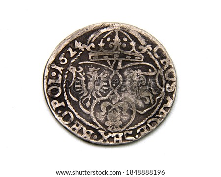 medieval European silver coin on white background
