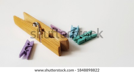 Pegs on a white background 