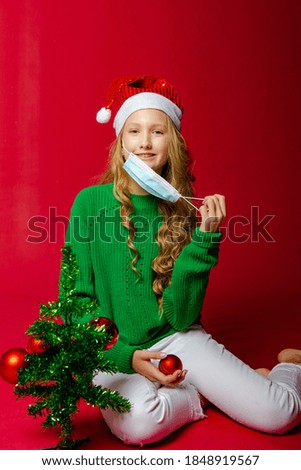 Cute teen girl on red background