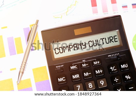 Word COMPANY CULTURE on calculator. Business and tax concept
