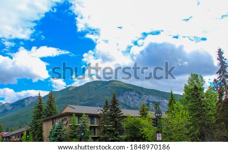 A landscape picture of the mountain and adjacent forest at the Banff National Park.