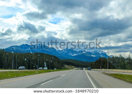 A landscape picture of the mountain and adjacent forest at the Banff National Park.