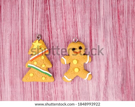 Toy in the shape of a Christmas tree, gingerbread cookie.