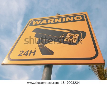Warning Security Cameras in 24 Hour Use Sign