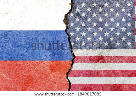 Russian VS American national flags symbol isolated on weathered broken cracked cement wall background, Russia USA relationship, abstract international politics conflicts concept texture wallpaper