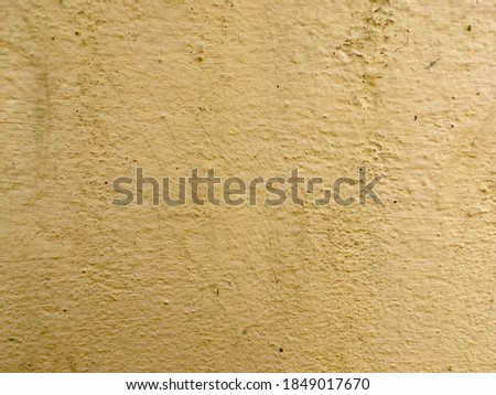 Vintage yellow cement texture background design 