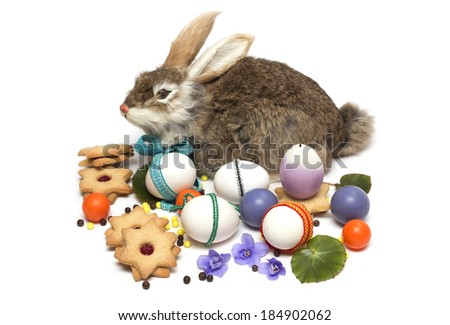 Happy Easter. Rabbit Easter Eggs and refreshments to the table. Photo.