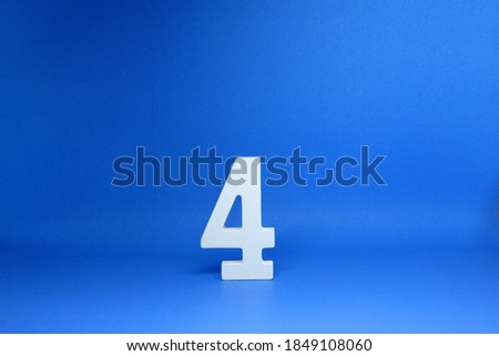 No 4 ( Four ) Isolated Blue  Background with Copy Space - Number 4 Percentage or Promotion success and the best winner Concept                             