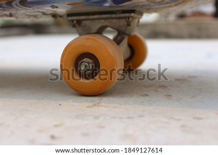 close up of skateboard brown wheel