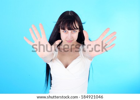 pretty young girl gesturing miracle with her hands, focus on her palms