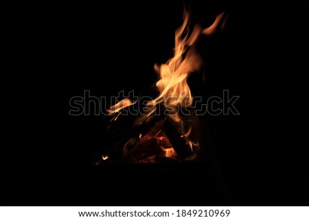 A photo of a bonfire taken during the camp