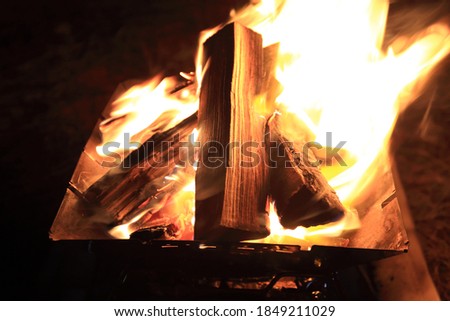 A photo of a bonfire taken during the camp