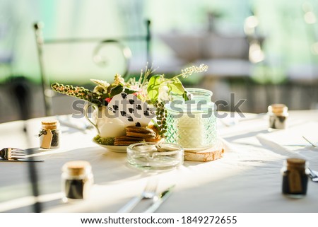 Wedding / Outdoor party table set up decoration. Tea party / Alice in Wonderland concept decoration. 