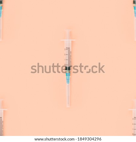 Background on the theme of medicine. Syringes seamless pattern.