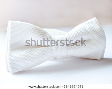 Men's White Bow Tie on white background