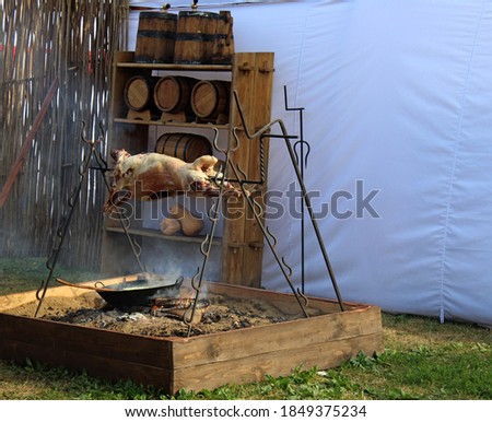 The cook prepares game and will treat guests